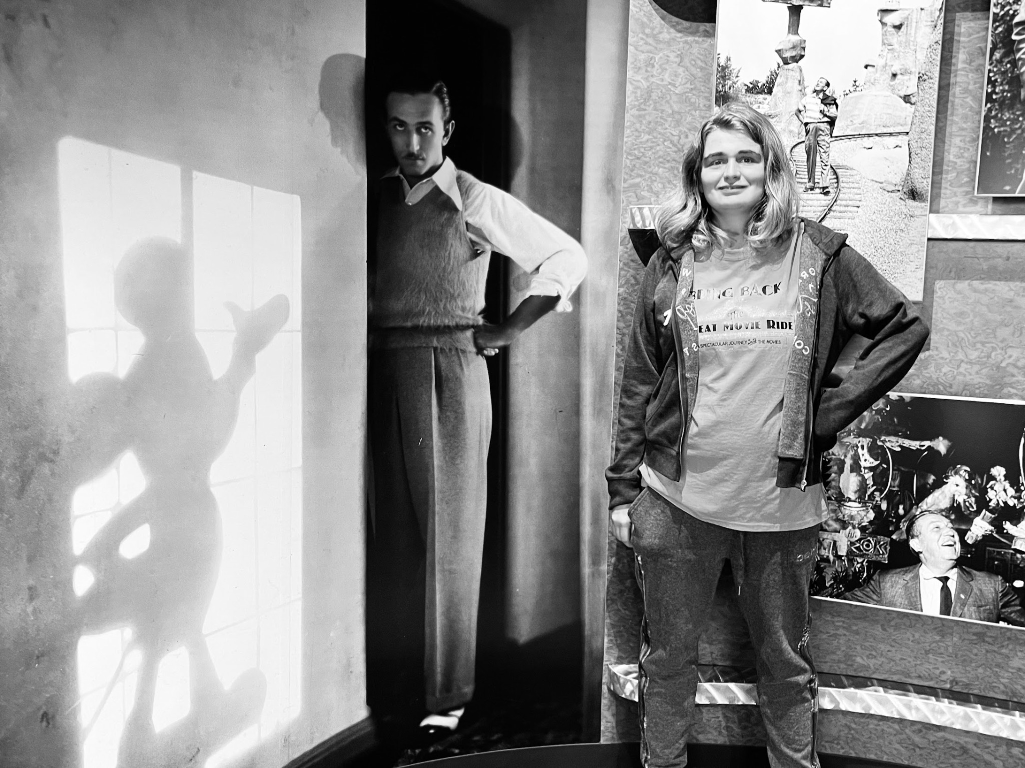 Sydney standing beside a classic black and white display